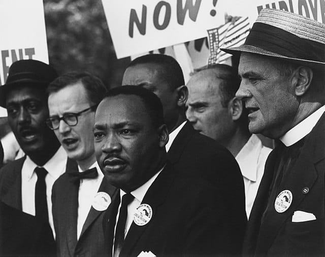 Civil Rights March on Washington, D.C. Dr. Martin Luther King Jr. and Mathew Ahmann in a crowd, NARA 542015